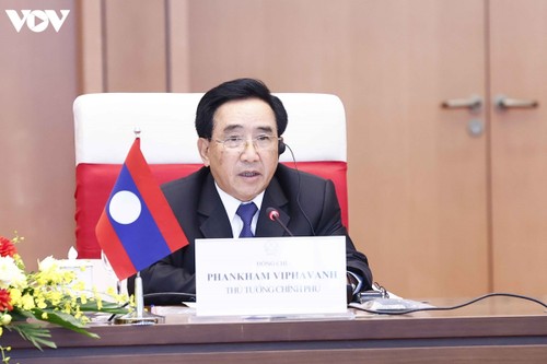Chủ tịch Quốc hội Vương Đình Huệ hội kiến với Thủ tướng Lào Phankham Viphavanh - ảnh 5