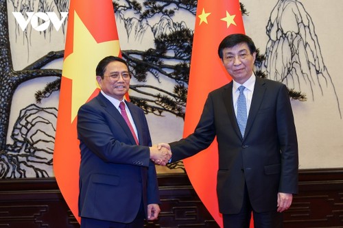 Thủ tướng Phạm Minh Chính hội kiến Chủ tịch Chính hiệp toàn quốc Trung Quốc Vương Hộ Ninh - ảnh 1