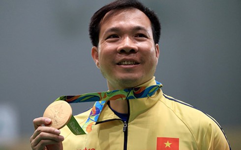Hoàng Xuân Vinh lọt top 10 vận động viên thành tích cao Olympic 2016 - ảnh 1