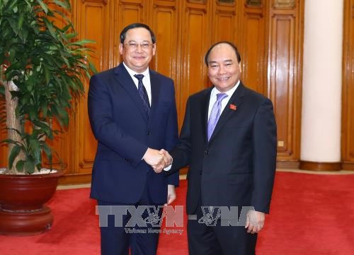 Tổng Bí thư Nguyễn Phú Trọng và Thủ tướng Nguyễn Xuân Phúc tiếp Phó Thủ tướng Lào  - ảnh 2