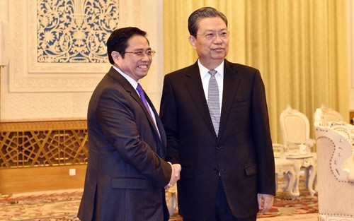 Lãnh đạo cấp cao Đảng Cộng sản Trung Quốc tiếp Đoàn Đại biểu Đảng Cộng sản Việt Nam - ảnh 1