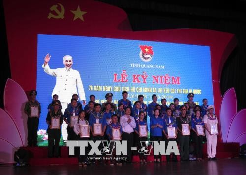 Người Việt Nam hưởng ứng phong trào thi đua yêu nước - ảnh 1