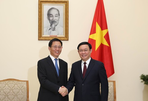 Phó Thủ tướng Vương Đình Huệ tiếp Phó Bí thư tỉnh uỷ Vân Nam Vương Dư Ba - ảnh 1
