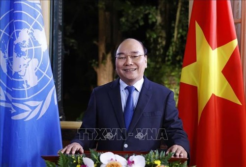 Chủ tịch nước Nguyễn Xuân Phúc: Việt Nam tự tin, sẵn sàng gánh vác nhiều trọng trách quốc tế - ảnh 1