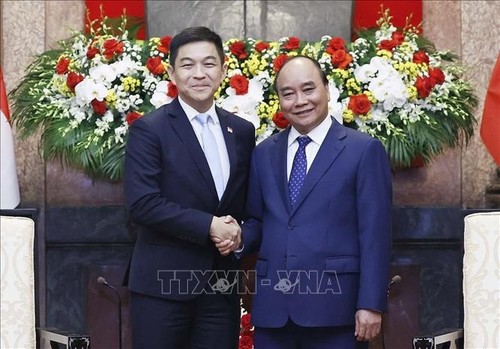 Chủ tịch nước Nguyễn Xuân Phúc tiếp Chủ tịch Quốc hội Singapore Tan Chuan Jin - ảnh 1