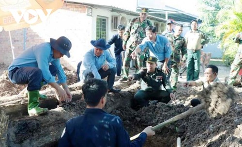 Quy tập 39 hài cốt liệt sĩ quân tình nguyện Việt Nam hy sinh ở Campuchia - ảnh 1