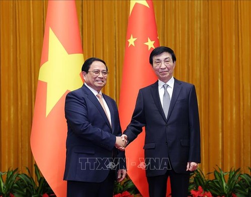 Thủ tướng Phạm Minh Chính hội kiến Chủ tịch Chính hiệp toàn quốc Trung Quốc, Vương Hộ Ninh - ảnh 1