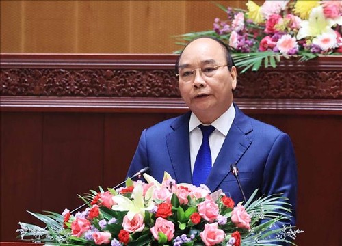 Вьетнам и Лаос уверенно идут по пути развития - ảnh 1