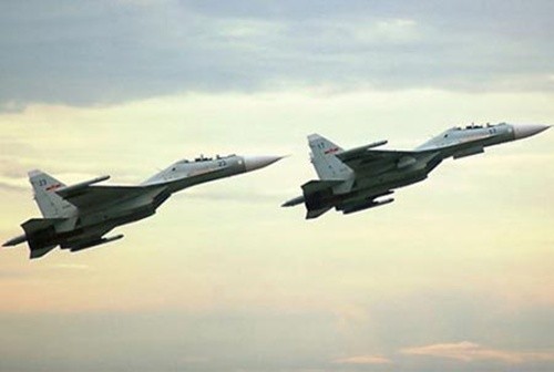 美国就中国战机异常接近日本飞机谴责中国 - ảnh 1