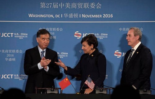 中国在与美国贸易关系中坚决维护中方利益 - ảnh 1