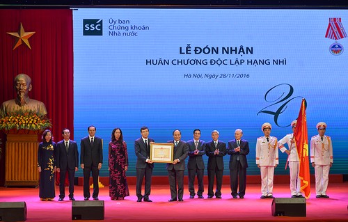 越南证券部门传统日20周年纪念大会在河内举行 - ảnh 1