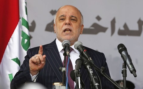 伊拉克总理阿巴迪承诺将保护库尔德人 - ảnh 1