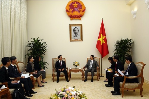 越南政府副总理武德担会见韩国副总理金相坤 - ảnh 1