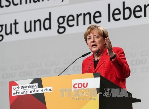 德国总理默克尔对与社会民主党的谈判前景表示乐观 - ảnh 1