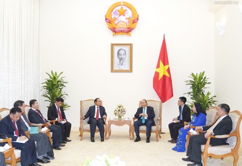 越南政府总理阮春福会见老挝政府副总理本通·吉马尼 - ảnh 1