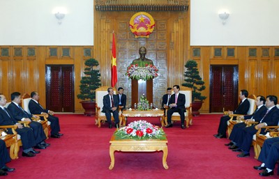 Thủ tướng Nguyễn Tấn Dũng tiếp đoàn đại biểu cấp cao Lào - ảnh 1