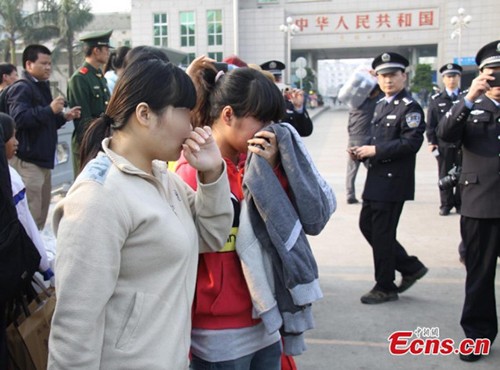 Cảnh sát Trung Quốc giải cứu 12 phụ nữ Việt Nam khỏi đường dây buôn người  - ảnh 1