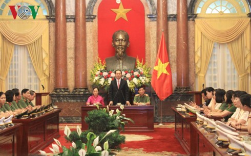 Chủ tịch nước Trần Đại Quang gặp mặt Phụ nữ Công an tiêu biểu năm 2016 - ảnh 1