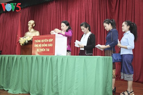 Cộng đồng người Việt Nam tại Lào đóng góp ủng hộ đồng bào bị ảnh hưởng bởi thiên tai - ảnh 1
