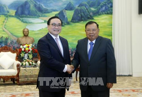Lãnh đạo Đảng, Nhà nước Lào tiếp Đoàn đại biểu cấp cao thành phố Hà Nội - ảnh 1