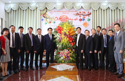 Chủ tịch UBND thành phố Hà Nội tới thăm, chúc Tết Tổng Hội thánh Tin lành - ảnh 1