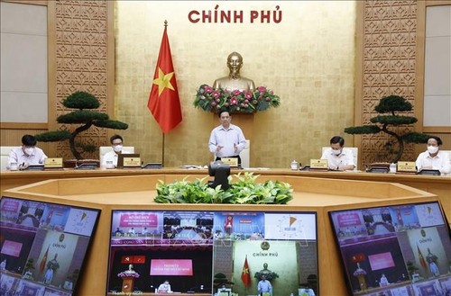 Việt Nam quyết tâm không để xảy ra khủng hoảng kinh tế và y tế - ảnh 1