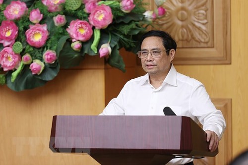 Thủ tướng  Phạm Minh Chính chủ trì phiên họp Ban Chỉ đạo quốc gia về tài chính toàn diện - ảnh 1