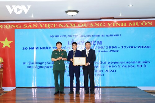 Kỷ niệm 30 năm Ngày truyền thống Đội tìm kiếm, quy tập hài cốt liệt sĩ quân khu 2 tại Lào  - ảnh 2