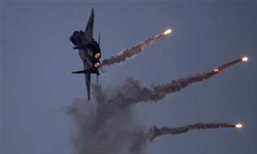 ОАЭ приостановлили участие в боевых налётах международной коалиции против ИГ - ảnh 1
