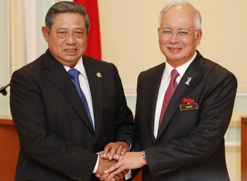 นายกรัฐมนตรีมาเลเซียเข้าร่วมการให้คำปรึกษาประจำปีระหว่างมาเลเซียกับอินโดนีเซีย - ảnh 1