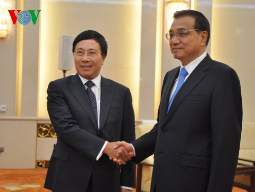 รองนายกรัฐมนตรีฝามบิ่งมิงพบปะกับนายกรัฐมนตรีจีนและรองนายกรัฐมนตรีรัสเซีย - ảnh 1