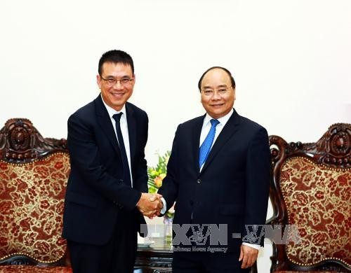 นายกรัฐมนตรีเวียดนามให้การต้อนรับประธานเครือบริษัทเอสซีจี - ảnh 1