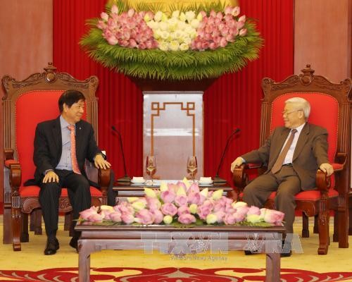 Party leader Nguyen Phu Trong receives Singapore’s PAP leader - ảnh 1