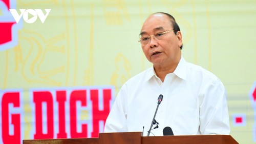 State President appeals for joint efforts in combating COVID-19 - ảnh 1