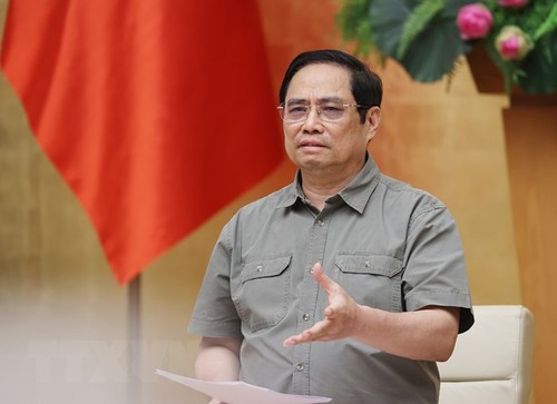 PM Pham Minh Chinh urges for high vigilance against pandemic - ảnh 1