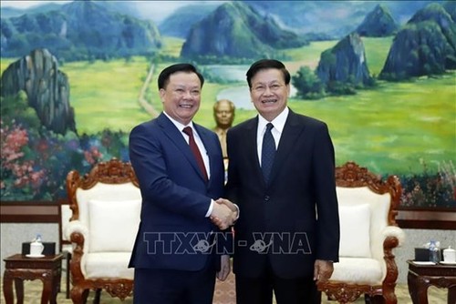 Top leader of Laos applauds Hanoi - Vientiane cooperation - ảnh 1
