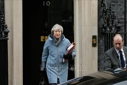 英脱欧：英国首相宣布延迟议会表决时间 - ảnh 1