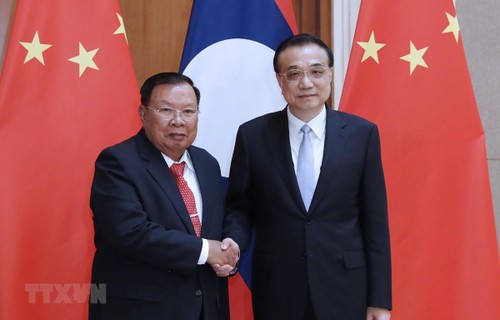 中国国务院总理李克强会见老挝人革党总书记、国家主席本扬 - ảnh 1