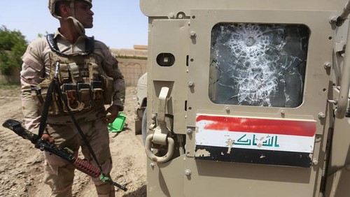 Dozens of IS militants killed in Iraq, Syria - ảnh 1