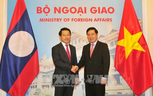 Vietnam, Laos hold 4th annual foreign ministerial consultation - ảnh 1