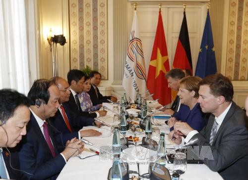 Primer ministro vietnamita sostiene reuniones bilaterales en Hamburgo  - ảnh 1