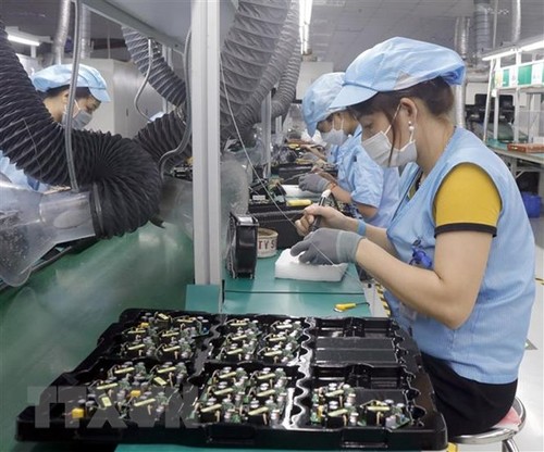 Banco singapurense: Vietnam sigue siendo destino atractivo para IED de manufactura - ảnh 1