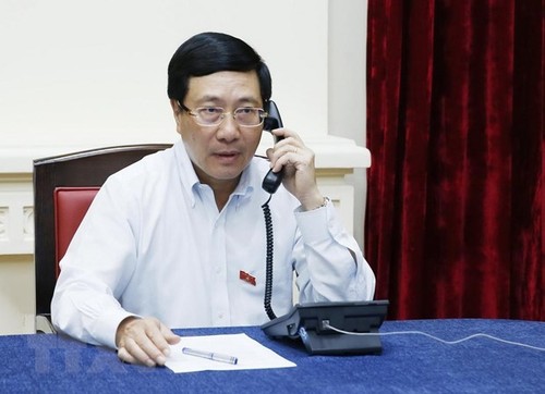 เวียดนามและสิงคโปร์พูดคุยทางโทรศัพท์เกี่ยวกับบทปราศรัยของนายกรัฐมนตรี ลีเซียนลุง - ảnh 1