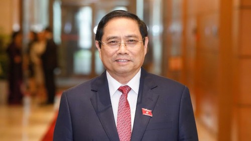 นาย ฝ่ามมิงชิ้ง ได้รับเลือกเป็นนายกรัฐมนตรีวาระปี 2021-2026 - ảnh 1