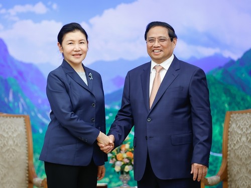 นายกรัฐมนตรี ฝ่ามมิงชิ้ง ให้การต้อนรับรัฐมนตรีว่าการกระทรวงยุติธรรมของจีน - ảnh 1