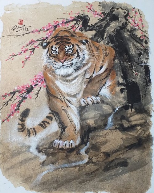 Lively paintings by Nguyen Doan Ninh to usher in Year of the Tiger - ảnh 20