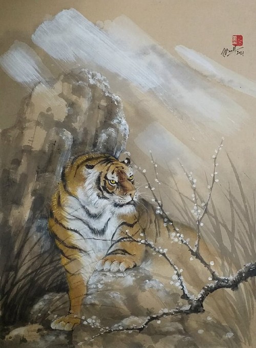Lively paintings by Nguyen Doan Ninh to usher in Year of the Tiger - ảnh 21