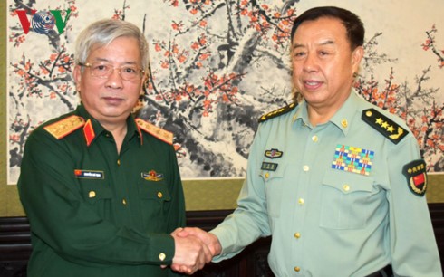 Vizevorsitzende der Militärkommission der KPCh empfängt vietnamesischen Vizeverteidigungsministerium - ảnh 1