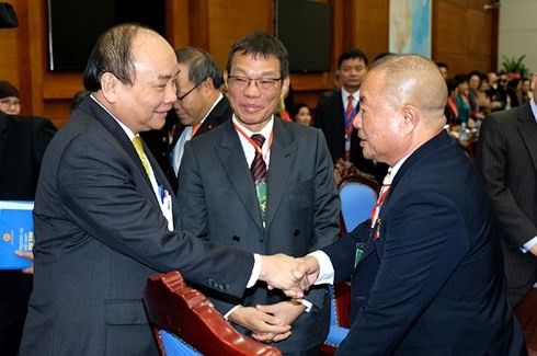 Hochrangige Politiker treffen mit Auslandsvietnamesen zum Neujahrsfest - ảnh 1