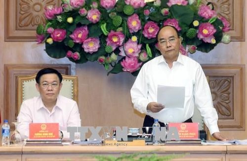 Premierminister Nguyen Xuan Phuc nimmt an der Sitzung des Nationalrats für Währungspolitik teil - ảnh 1